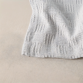 LUMINOFT – Atmungsaktive Strick-Baumwolldecke