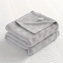 LUMINOFT – Atmungsaktive Strick-Baumwolldecke