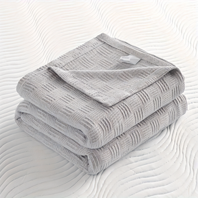 LUMINOFT – Atmungsaktive Strick-Baumwolldecke