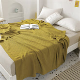 LUMINOFT – Atmungsaktive Strick-Baumwolldecke